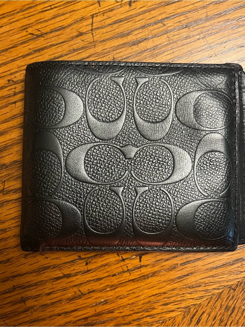 Coach Men's Black Signature Embossed Leather Bifold Wallet